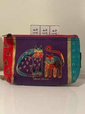 This Laurel Burch cosmetic bag features a vibrant "Fantastic Felines" pattern.